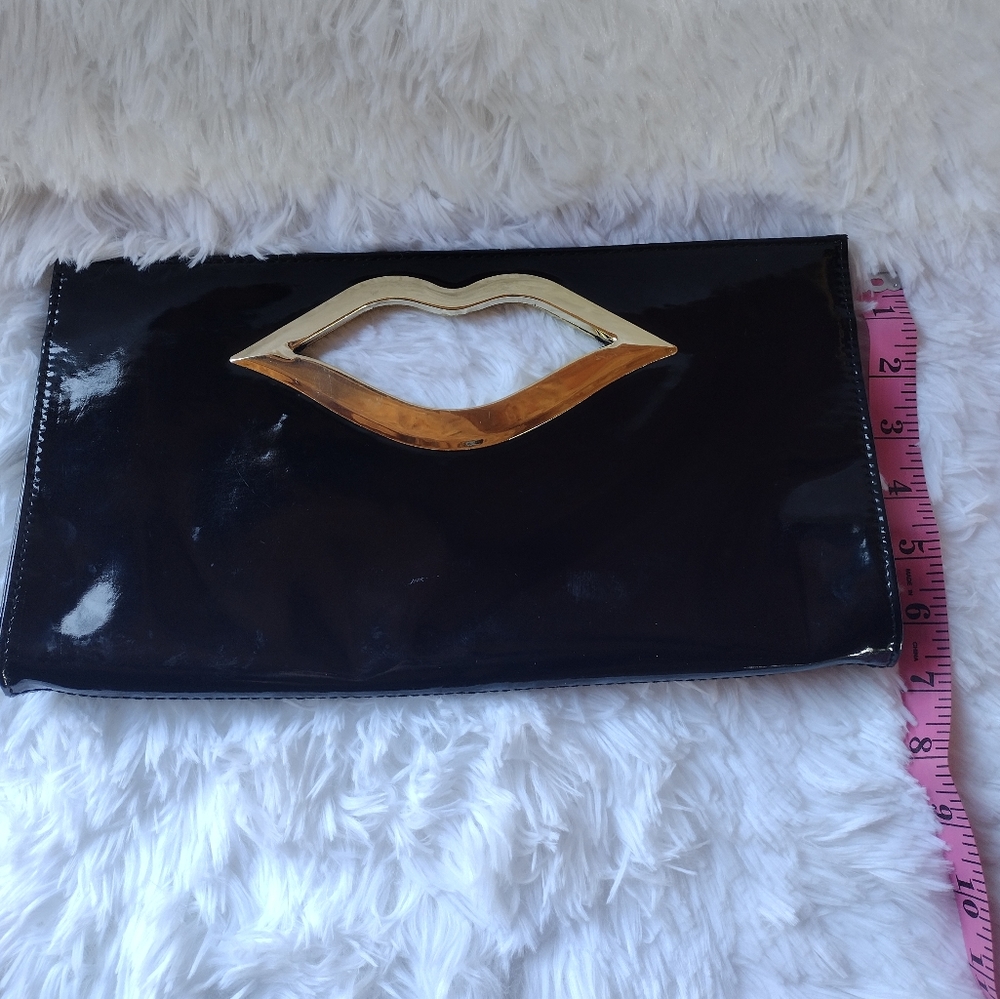 Black and gold lip clutch purse